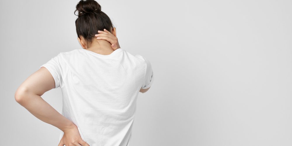 woman-holding-neck-health-care-isolated-background