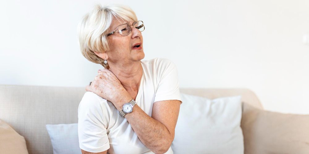 close-up-sad-senior-lady-with-neckache-senior-woman-with-chronic-pain-syndrome-fibromyalgia-suffering-from-acute-neckaches-senior-woman-suffering-from-neck-pain