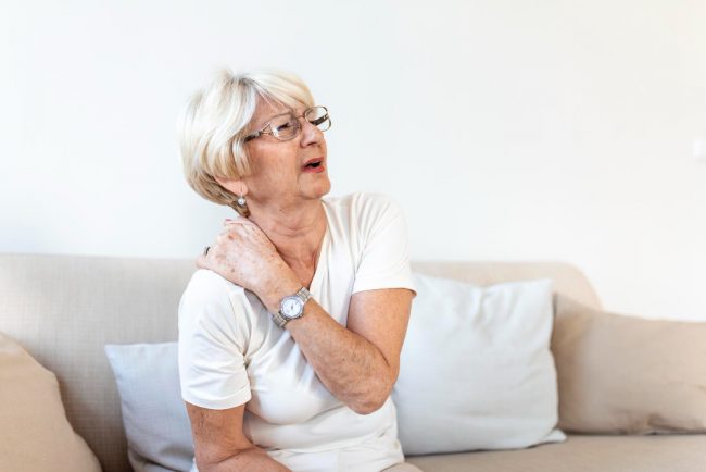 close-up-sad-senior-lady-with-neckache-senior-woman-with-chronic-pain-syndrome-fibromyalgia-suffering-from-acute-neckaches-senior-woman-suffering-from-neck-pain